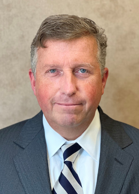 John D. Holden 